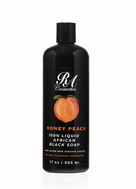 Black bottle of honey peach liquid soap with peach illustration on a white background