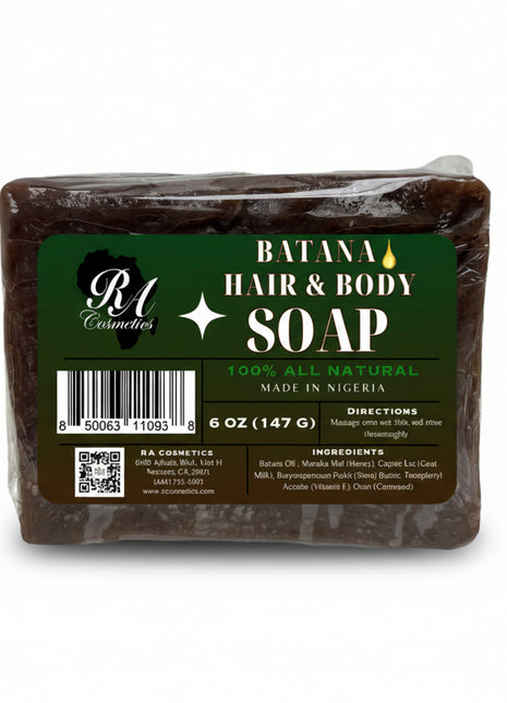 A packaged bar of Batana Hair & Body Natural Soap with product information and branding visible on the label.