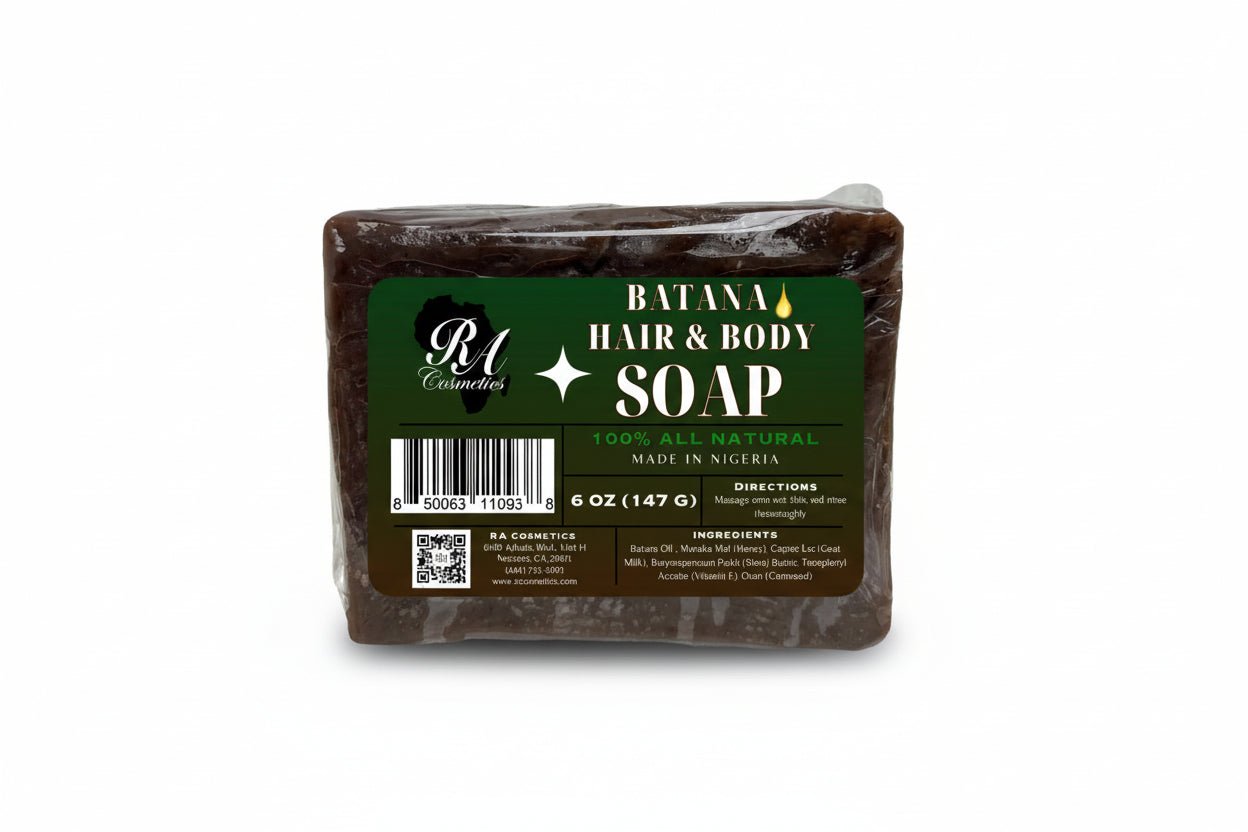 A packaged bar of Batana Hair & Body Natural Soap with product information and branding visible on the label.