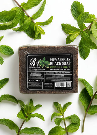 Block of 100% African Black Soap with a label on a white background